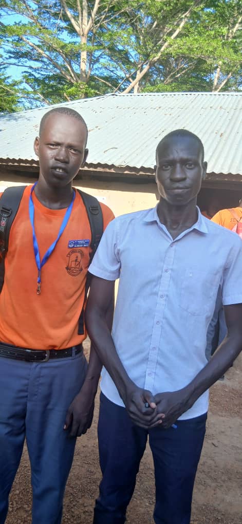 Students and teacher at Saint Andrews High School
